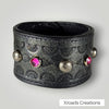 Cuff - Hand Stamped with pink rhinestones and decorative studs
